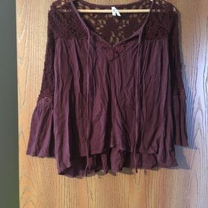 Maroon blouse.